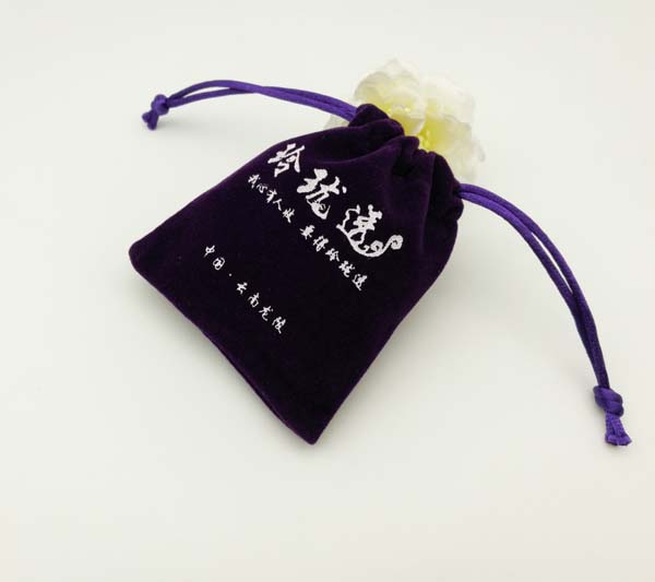 small purple velvet jewelry bag