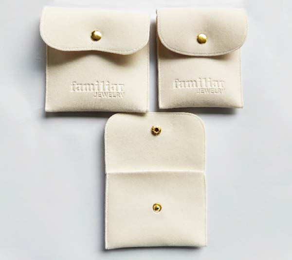 off-white velvet envelope jewelry bag with emboss logo