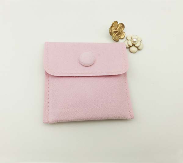 pink velvet jewelry envelope pouch with fabric covered button 