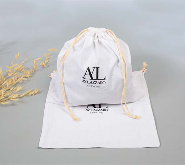 white cotton shoes dust bag