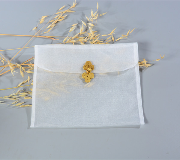 white organza scarf pouch with button closure
