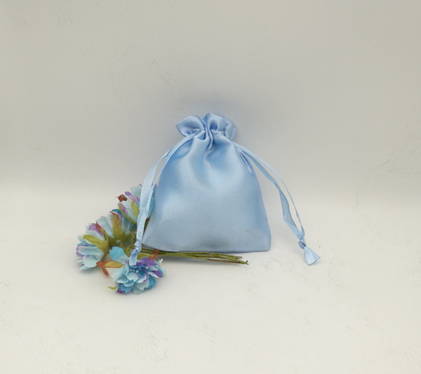 small blue satin pouch